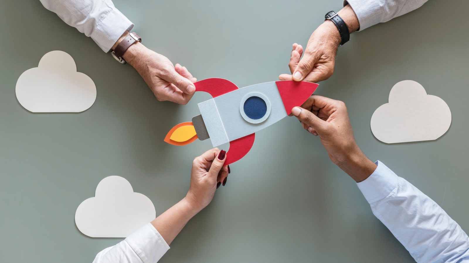 business-people-with-startup-rocket